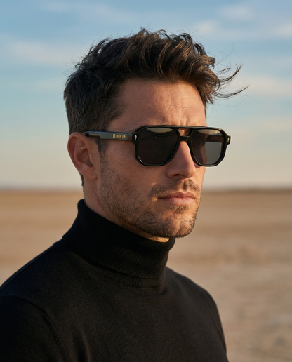 Man wearing Iron Up Capone sunglasses in the desert